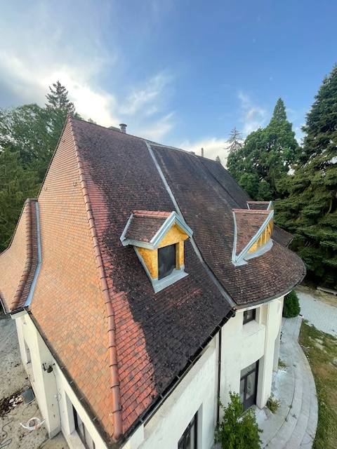 Pourquoi nettoyer votre toiture à Dommartin